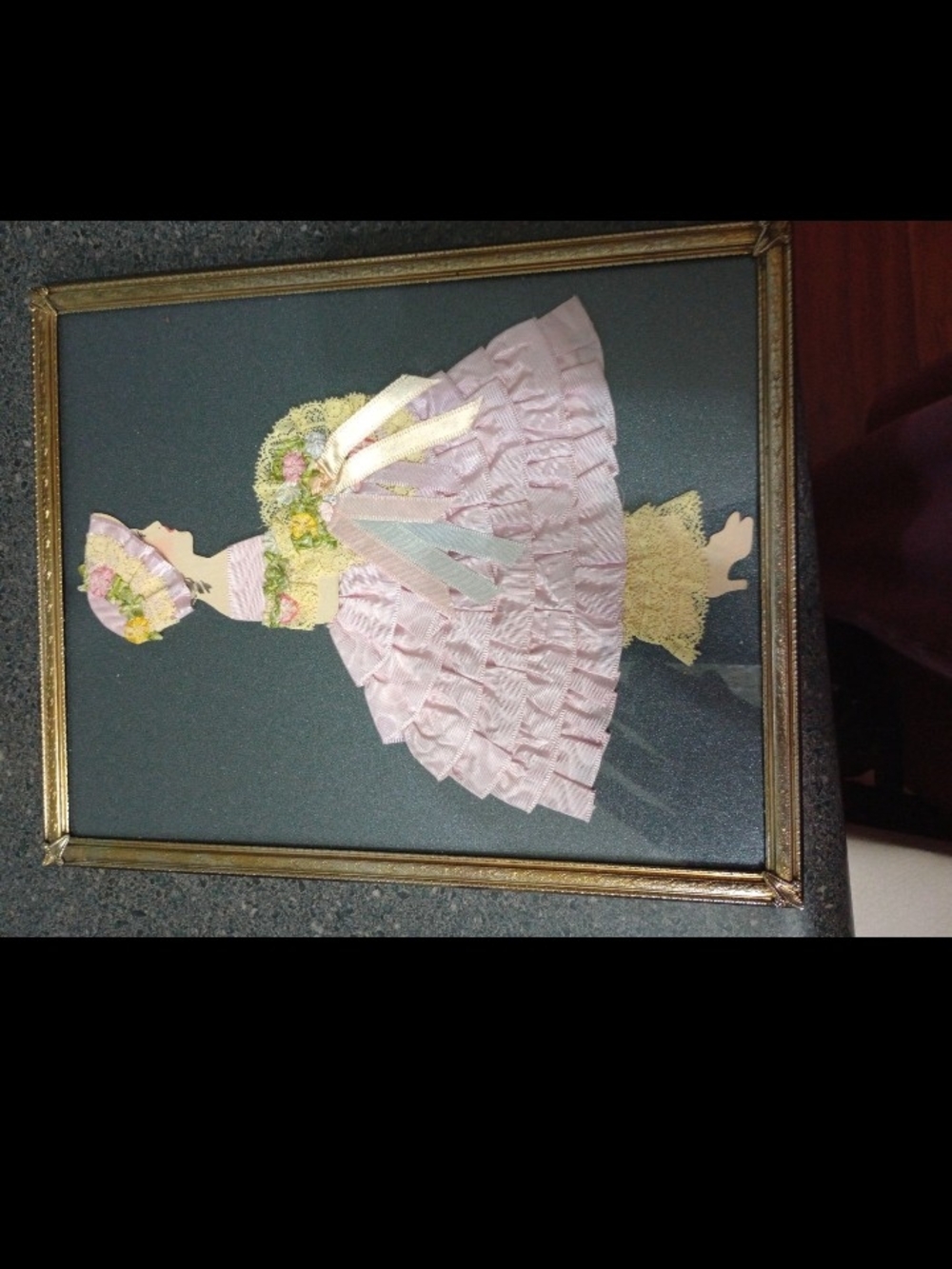 Vintage fabric picture of lady in pink dress framed